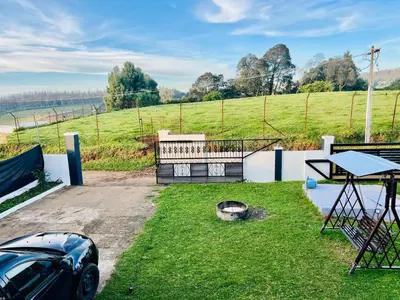 a car parked next to a ping pong table at Teyt Castle - Ooty - Nilgiris in Ooty