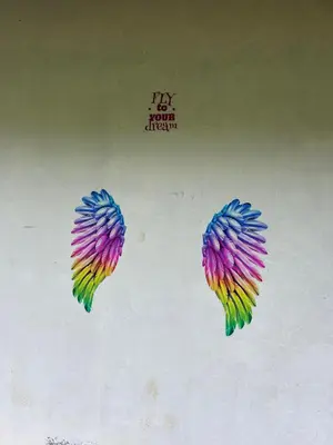three colorful kites are hanging on a wall at Kanthalloor puregolds in Kanthalloor
