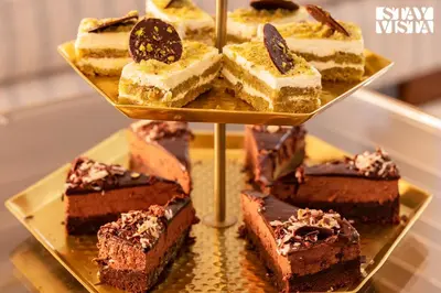 a bunch of different types of desserts on a plate at StayVista at Hermitage 4BR - Boutique Stay - Relax in Nature in Irpu