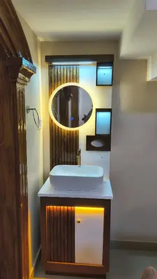 a bathroom with a sink and a mirror at Hideout luxe in Ooty