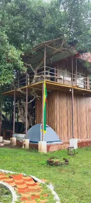 a building with a flag in front of it at Wild Ni8 Club