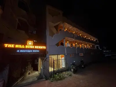 a building with a sign that reads the hill burn heeth at The Hill Bunk Heights Ooty in Ooty