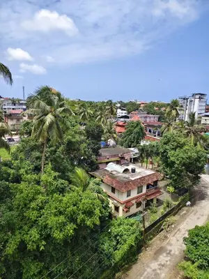 an overhead view of a house in a city at Darshanam Inn in Guruvāyūr