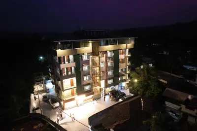an overhead view of a building at night at Spezio Luxurious Apartments in Perintalmanna