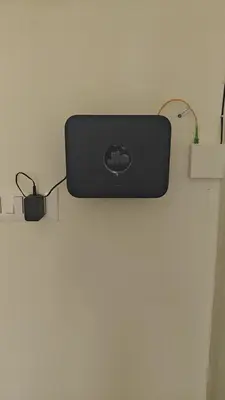 a black router and a mouse on a table at Gamani in Mysore