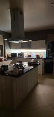 a kitchen with a counter top in a kitchen at Neom Valley in Ketti