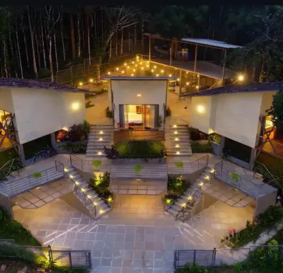 an aerial view of a patio at night with lights at LAKE N DAZE by Masika stays in Ambalavayal