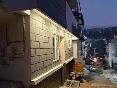 a building with a window on the side of it at BBR Residency in Ooty