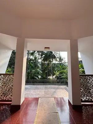 a view from the hallway of a house with a balcony at Sawan house in Tāzhekkod