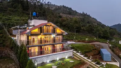 a house on the side of a mountain at Orchid Villa Kotagiri in Kodanād