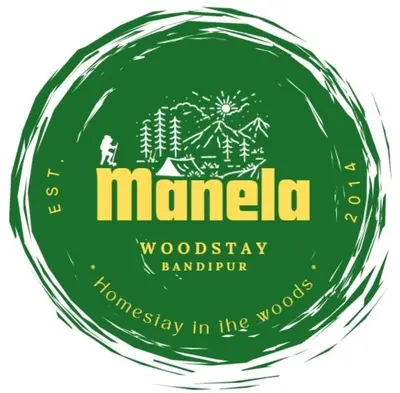 a green logo for manalo woodsy barkery in the woods at Manela Woodstay - A Homestay in the Woods at Bandipur in Bandipūr