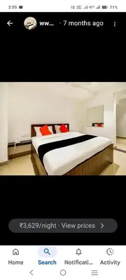 a screenshot of a bedroom with a bed at AB Merridien in Coimbatore