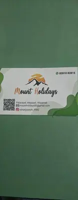 a box of mountain holidays on a green background at Mount holidays in Meppādi