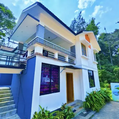 a view of the front of a house at z in wayanad in Kalpetta