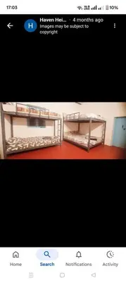 a picture of two bunk beds in a room at Haven heights kanthalloor in Kanthalloor