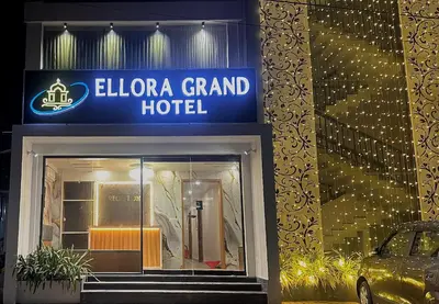 a hotel with a sign that reads elena grand hotel at Ellora grand hotel in Kozhikode