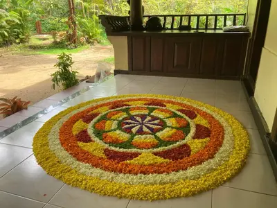 a large rangoli on the floor of a house at Kakkakuni heritage in Kozhikode