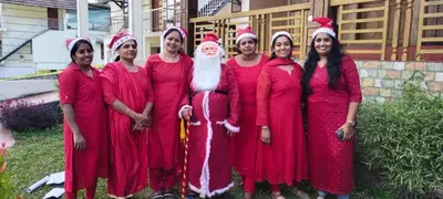a group of women dressed in santa claus costumes at JackRoot Athirappilly in Kallana
