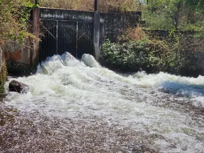 a water fall with rapids on a river at Wildways Mudumalai Homestay in Masinagudi