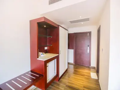 a bathroom with a sink and a mirror at Samudra Mysore in Mysore