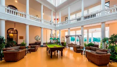 a large room with a pool table in it at Royal Orchid Brindavan Garden Palace & Spa Mysore in Belagula
