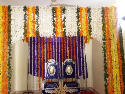 a curtain with colorful beads on a window at Krishnendu Homestay outer ring road north nada guruvayur in Guruvāyūr