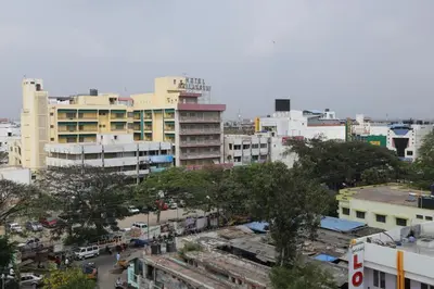 a view of a city with buildings and trees at Hotel Srilakshmi in Coimbatore