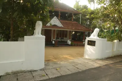 two white concrete barriers in front of a house at Mi Casa Tu Casa Homestay in Cochin
