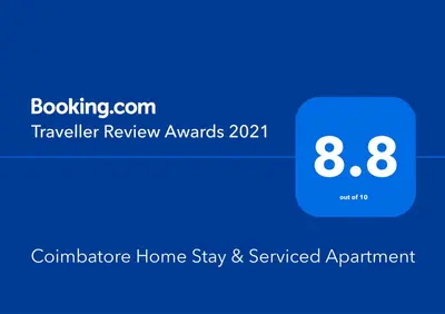 a blue sign with the number eight on it at Coimbatore Home Stay & Serviced Apartment in Coimbatore