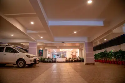 a car parked in a parking lot in a building at Park Avenue Suites in Coimbatore