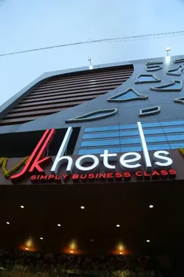 a large sign on the side of a building at JK HOTELS in Coimbatore