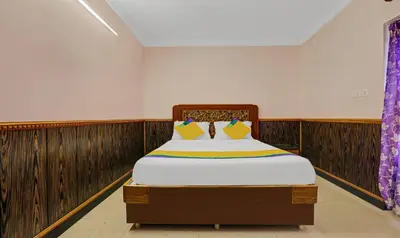 a bed in a room with wood paneling at Itsy Hotels Rain Forest, 1 km from Rose Garden in Ooty