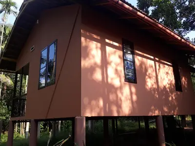 a rendering of a house with the sun shining on it at Family villa .hut in Tariyod