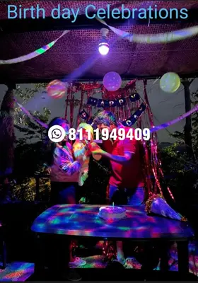 a group of people playing a drum set at a party at Shining Caves Resort in Varagampadi