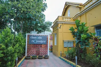 a sign that reads crooksfield r company in front of a building at Roambay in Mysore