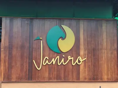 a sign that says varina on a wooden fence at Janiro Tea Trees Villas in Vythiri