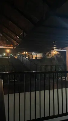 a view of a train station at night at Caffeine Villa in Kaniyāmbetta