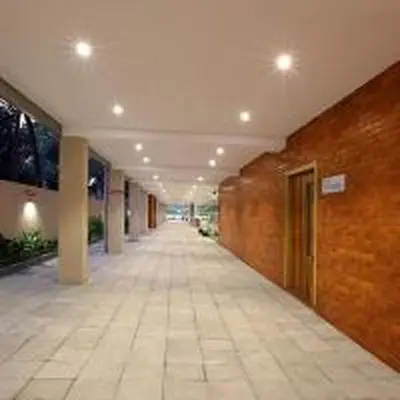 an empty hallway of a building with a long corridor at Park Residency Kodungallur in Trichūr