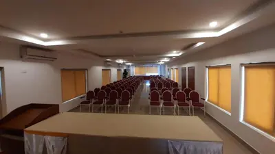 an empty room with chairs and a table in it at HOTEL SURYA in Iritti