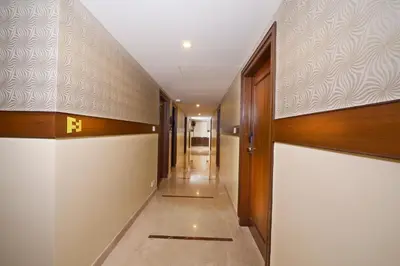 a corridor of a building with a hallway at HOTEL THE FORTUNE in Coimbatore