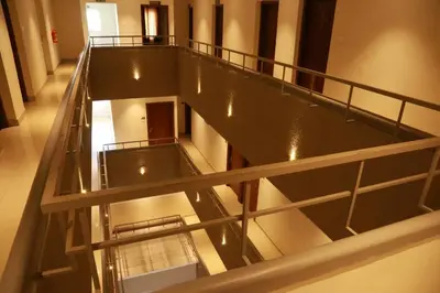 an overhead view of a staircase in a building at Hotel Picnic in Manjeri