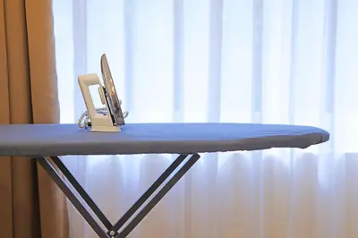 a table with a computer monitor on top of it at Krishnavalsam Regency in Guruvāyūr