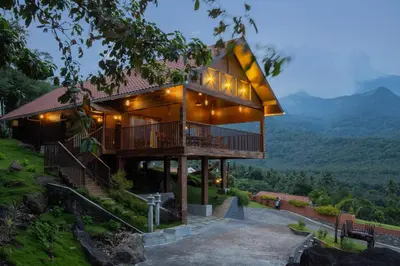a house on a hill with a view at Au Revoir Wellness Resort, Malampuzha in Palakkad