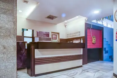 a view of a waiting room at a restaurant at Hotel O Kota Lodge in Coimbatore