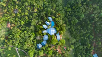 an overhead view of a house in the forest at Vyna Hillock Resort in Vythiri