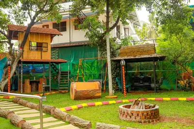 a park with a playground with a play structure at Belljem Homes -your own private resort -2 BHK GF in Trichūr