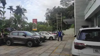 a group of cars parked in a parking lot at HOTEL SKY PARADISE in Iritti