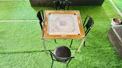 an overhead view of a table and chairs on the grass at Skyfall 900kandi in Meppādi