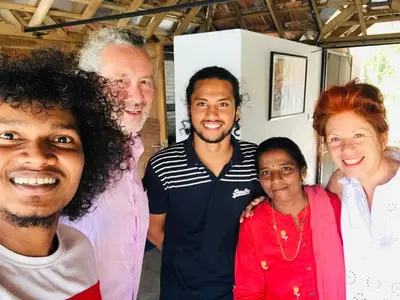 a group of people posing for a picture at Vala House in Cherai Beach