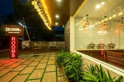 a store window with a sign in front of it at Daan Regency in Trichūr